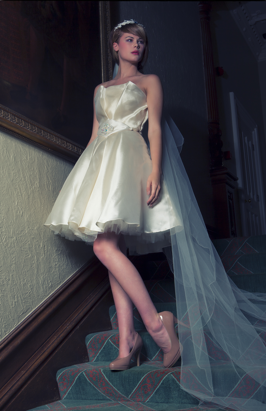 long train converts this to an iconic wedding dress showing off the slim figure and long legs